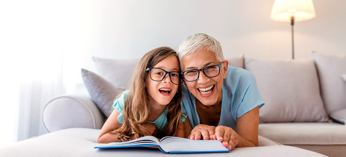 Grandma And Grand Daughter Reading